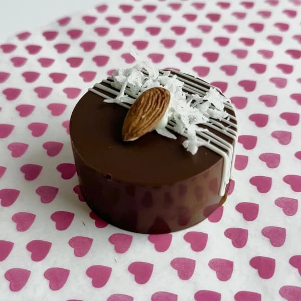 Almond Delight - chocolate coconut cake with a creamy ganache and almond center
