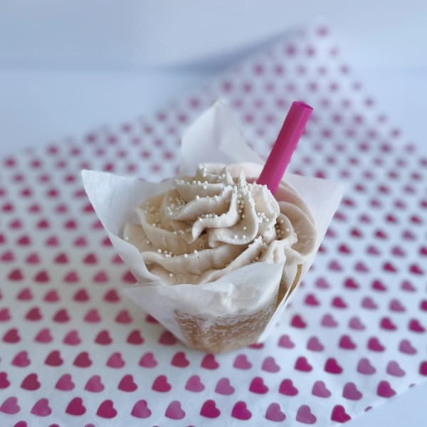 Root Beer Float - fizzy root beer cupcake topped with creamy vanilla frosting and a swirl of soda-inspired sweetness