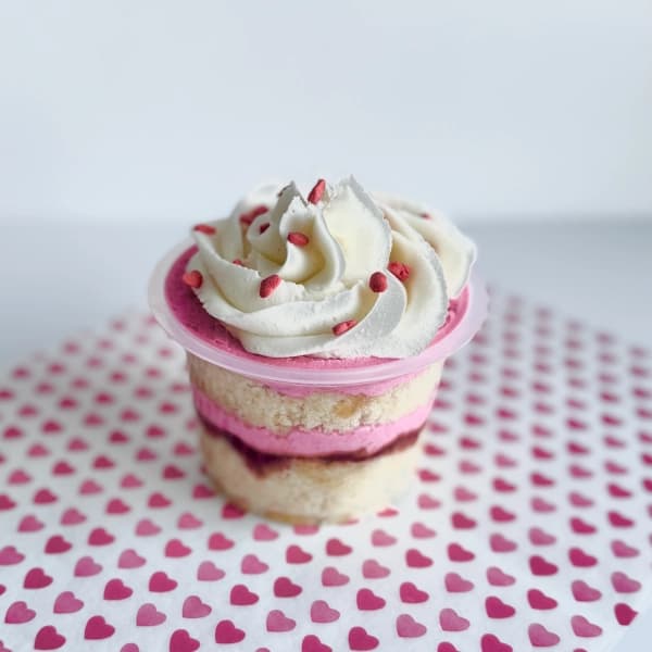 Berry Bliss - layers of vanilla cake, berries, and creamy frosting
