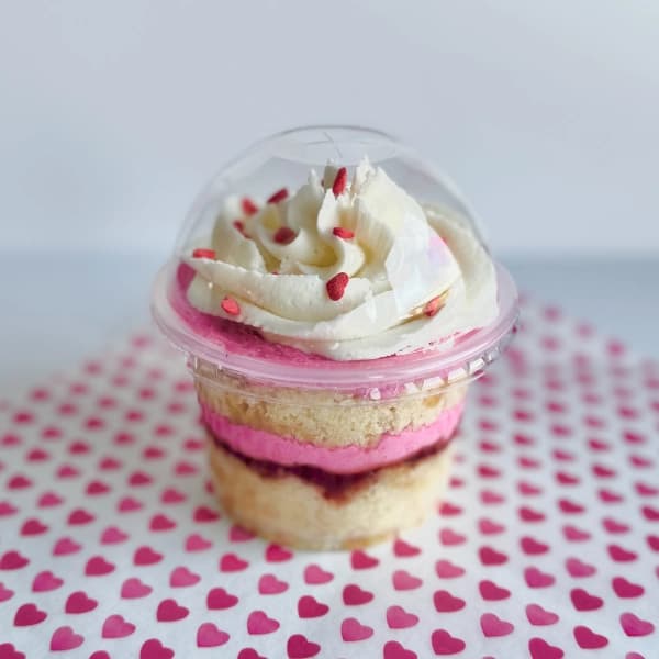 Berry Bliss - layers of vanilla cake, berries, and creamy frosting