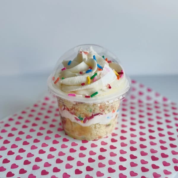 Birthday Cake - layers of vanilla cake, creamy frosting and colorful sprinkles