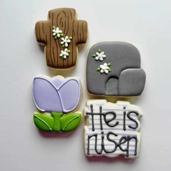 Four religious-themed sugar cookies