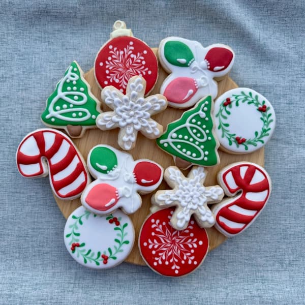 An assortment of Christmas-themed sugar cookies